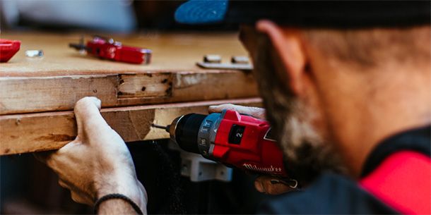 Handyman working on doors